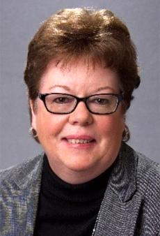 A person wearing glasses    Description automatically generated with low confidence